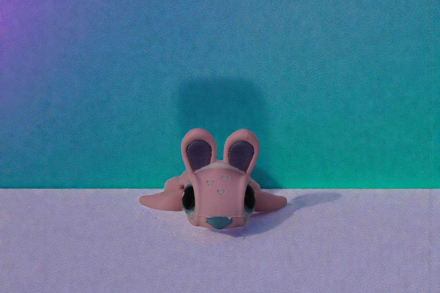 Straight on front view of the articulated pastel bunny turtle decor highlighting symmetrical ears and facial details.